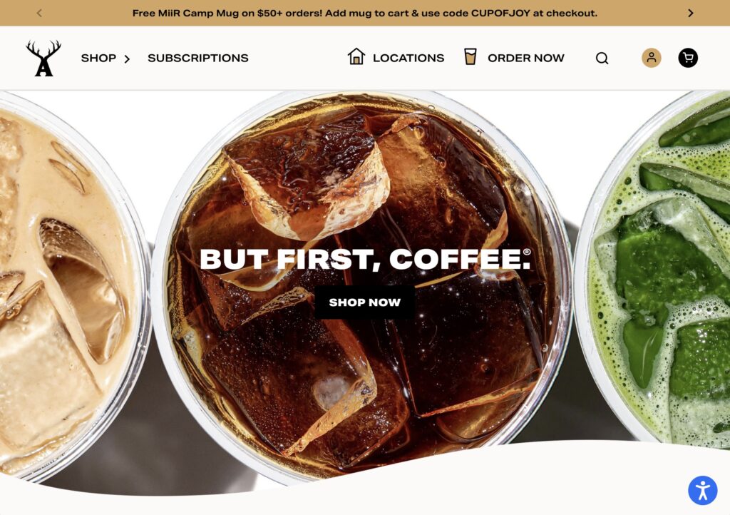 A vibrant banner showcasing iced coffee beverages, including a creamy latte, cold brew with ice cubes, and a matcha latte. The center features bold text, "BUT FIRST, COFFEE," with a "Shop Now" button below. 